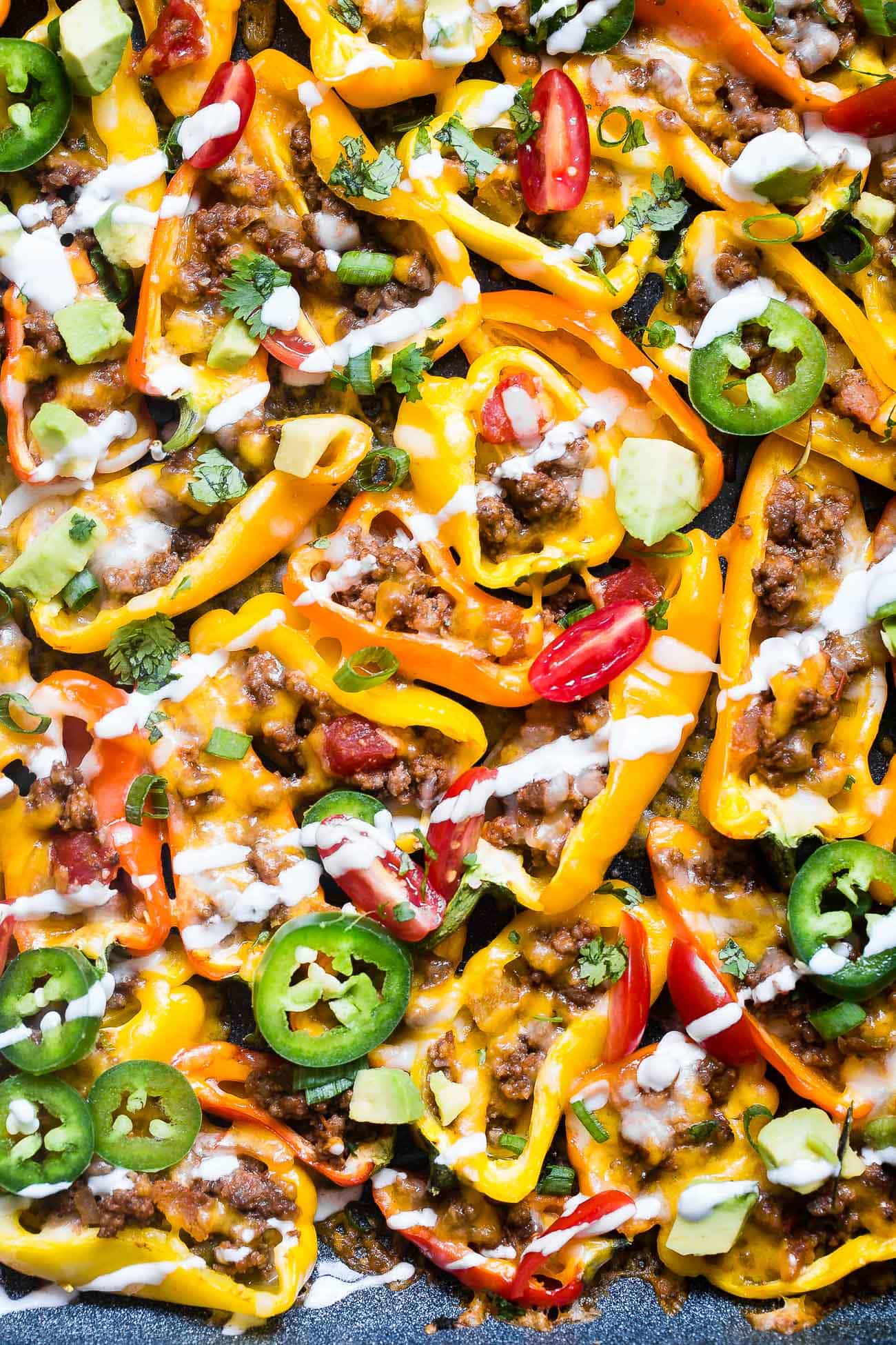 Close up photo of mini bell pepper nachos. Recipe on Foodfaithfitness.com