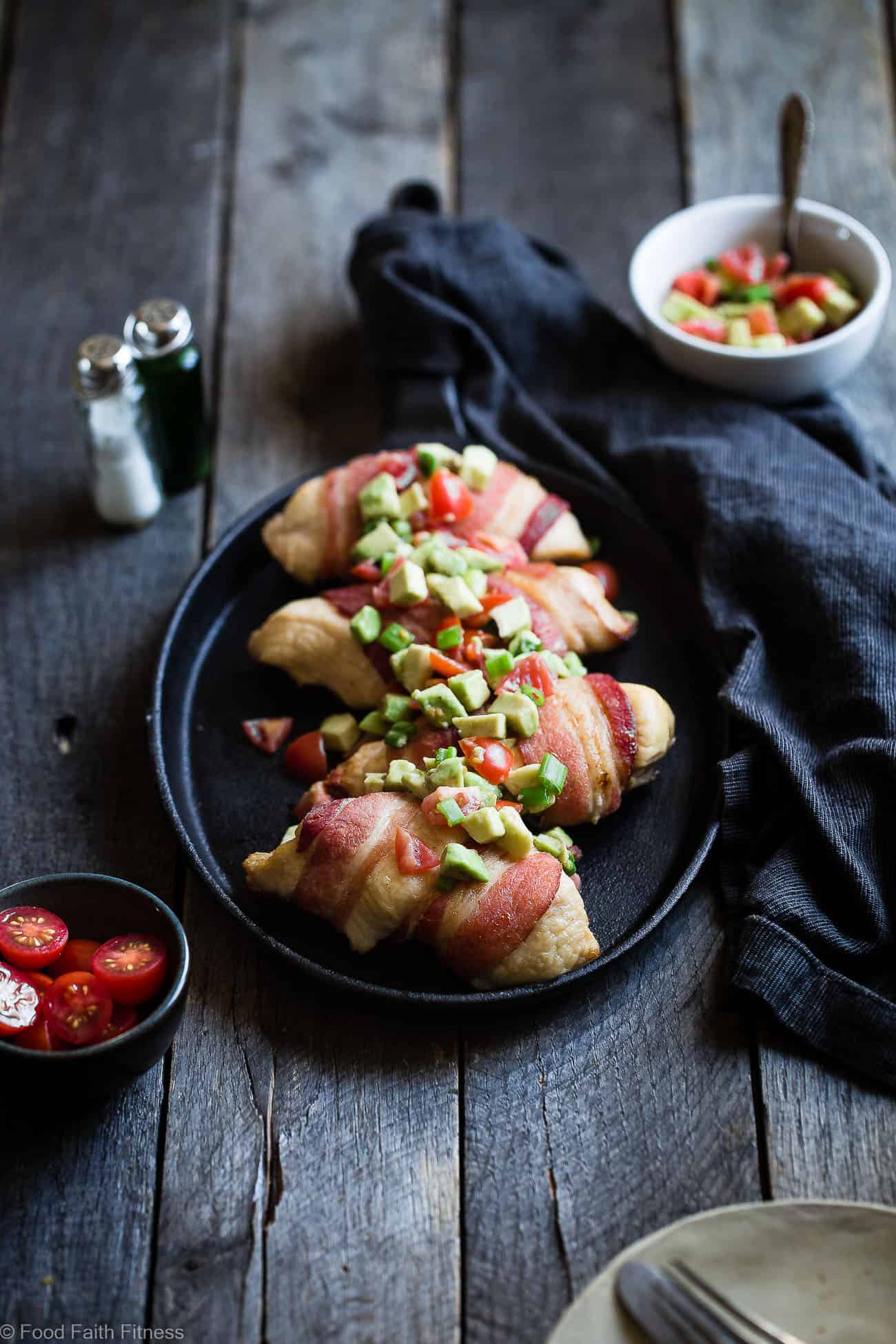 Whole30 Oven Baked Bacon Wrapped Chicken Recipe - with a CREAMY, addicting avocado salsa, this is one quick and easy, kid friendly dinner that's paleo, keto and whole30 compliant! | Foodfaithfitness.com | @FoodFaithFit