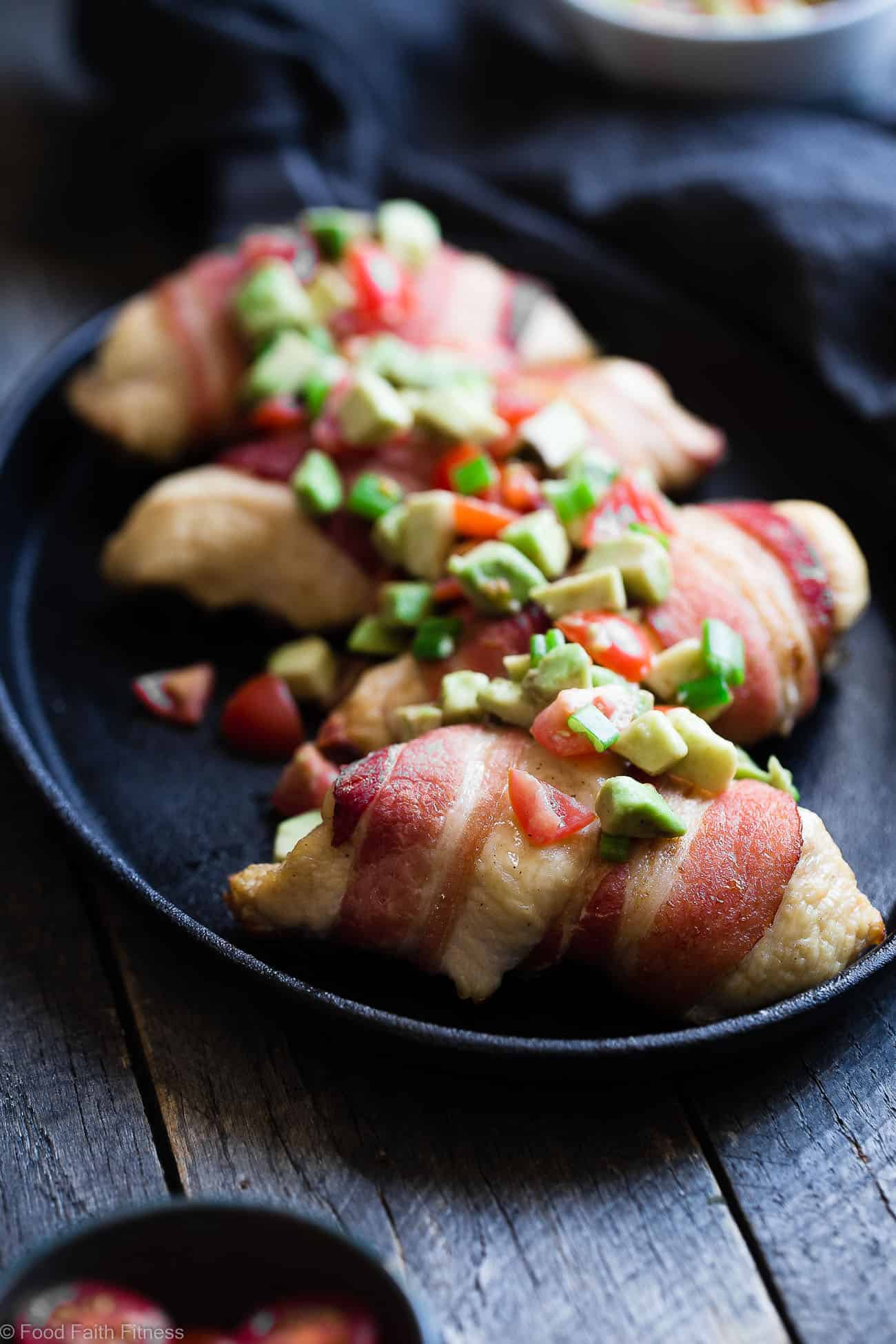 Whole30 Oven Baked Bacon Wrapped Chicken Breast - with a CREAMY, addicting avocado salsa, this is one quick and easy, kid friendly dinner that's paleo, keto and whole30 compliant! | Foodfaithfitness.com | @FoodFaithFit