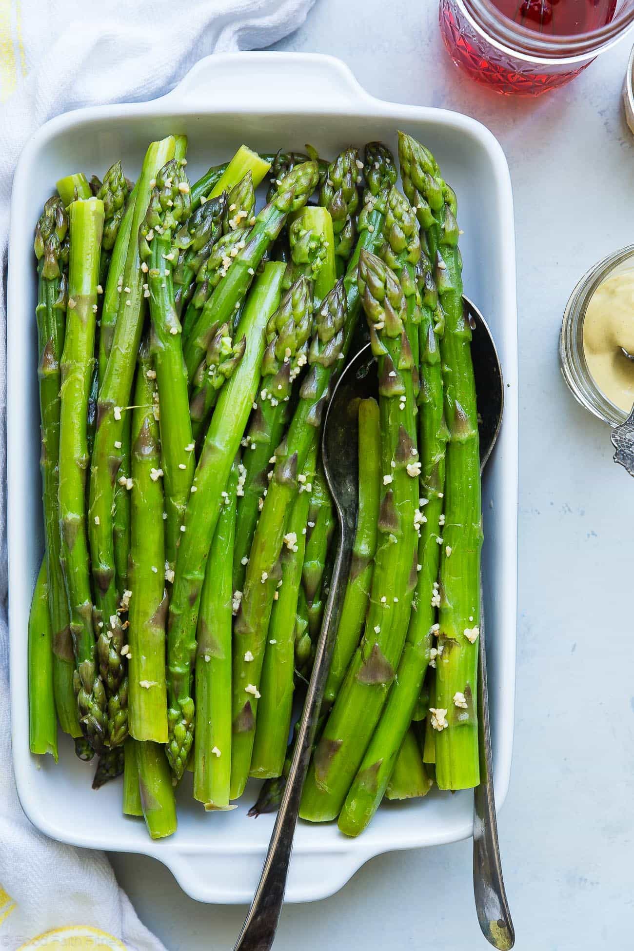 Overhead photograph of blanched asparagus. Recipe on foodfaithfitness.com