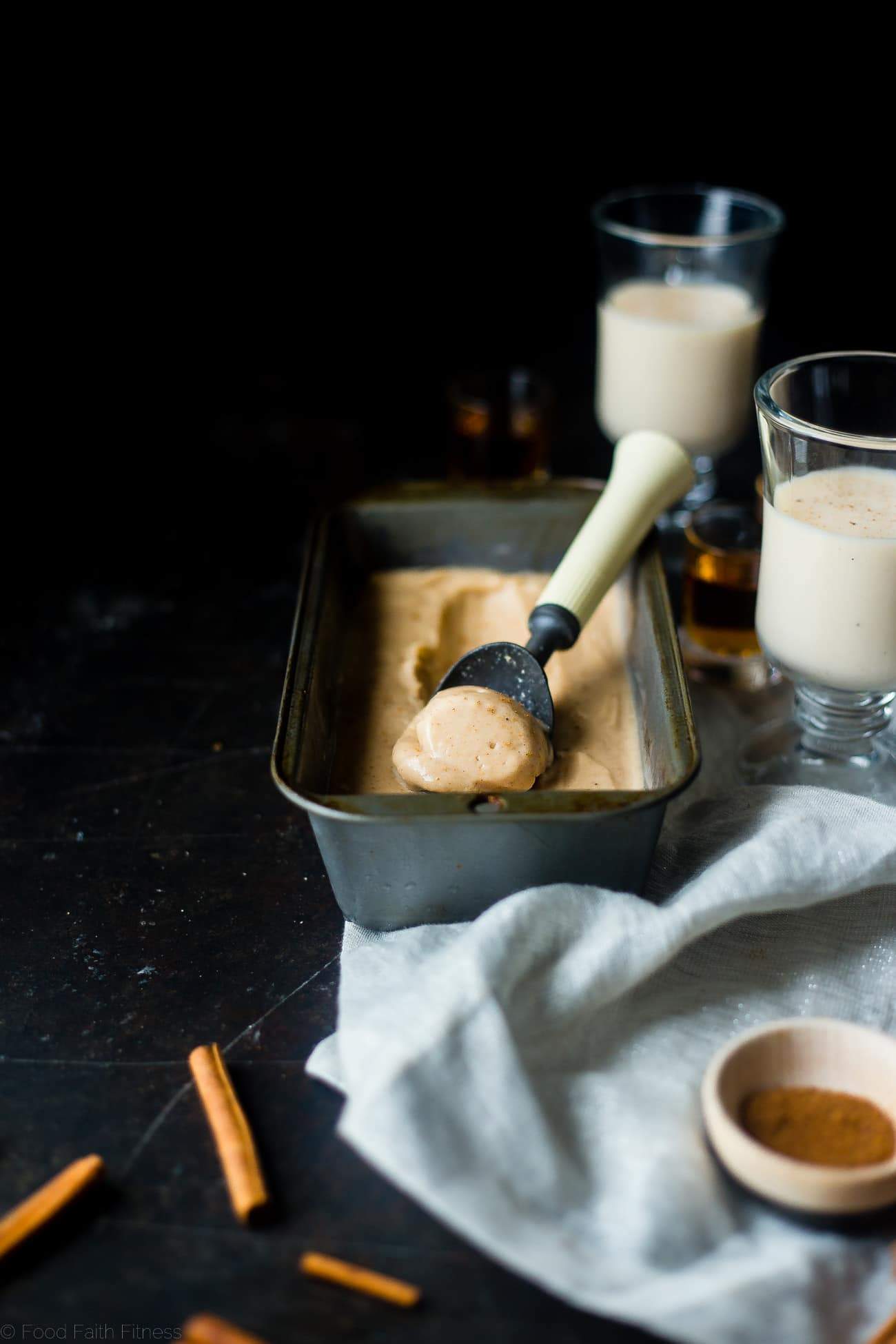 Vegan Rum and "Egg Nog" Ice Cream - This creamy, coconut milk ice cream tastes like frosty version of drinking a rum and eggnog...without the dairy or eggs! It's a healthy treat for the holidays! | Foodfaithfitness.com | @FoodFaithFit