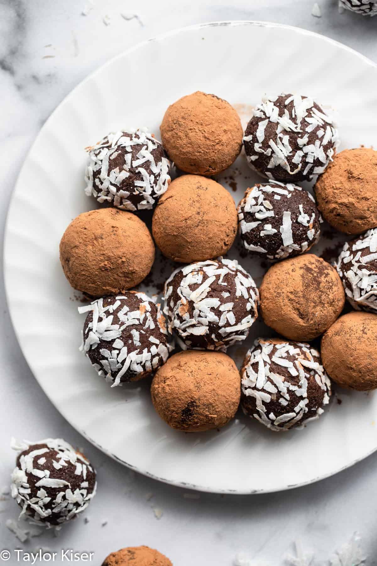 a stack of healthy avocado chocolate truffles on a plate