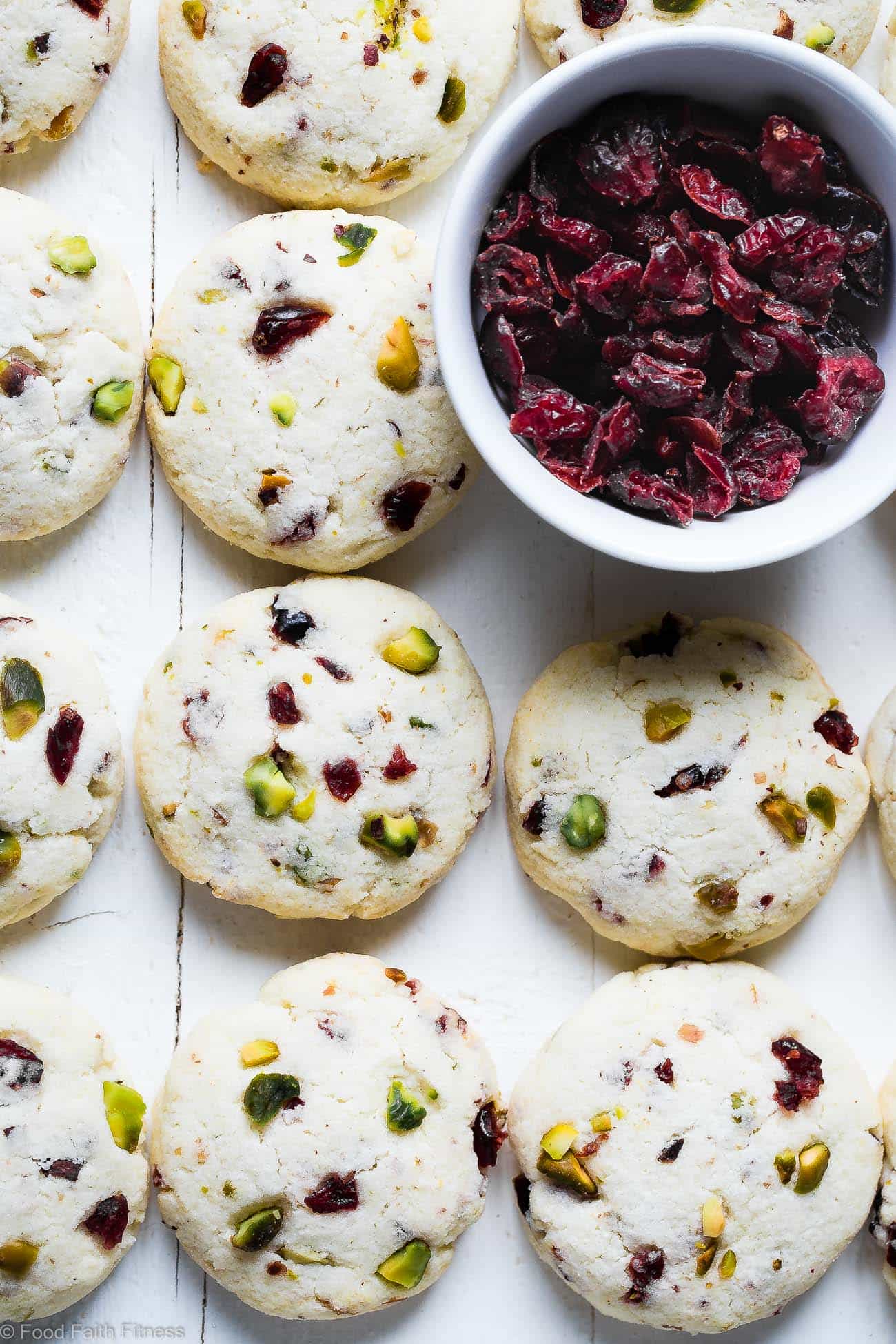 Chewy Gluten Free Sugar Free Sugar Cookies Recipe - These quick and easy, CHEWY sugar free cookies have tangy and crunchy cranberries and pistachios! They're a healthier Christmas treat for only 95 calories! | Foodfaithfitness.com | @FoodFaithFit