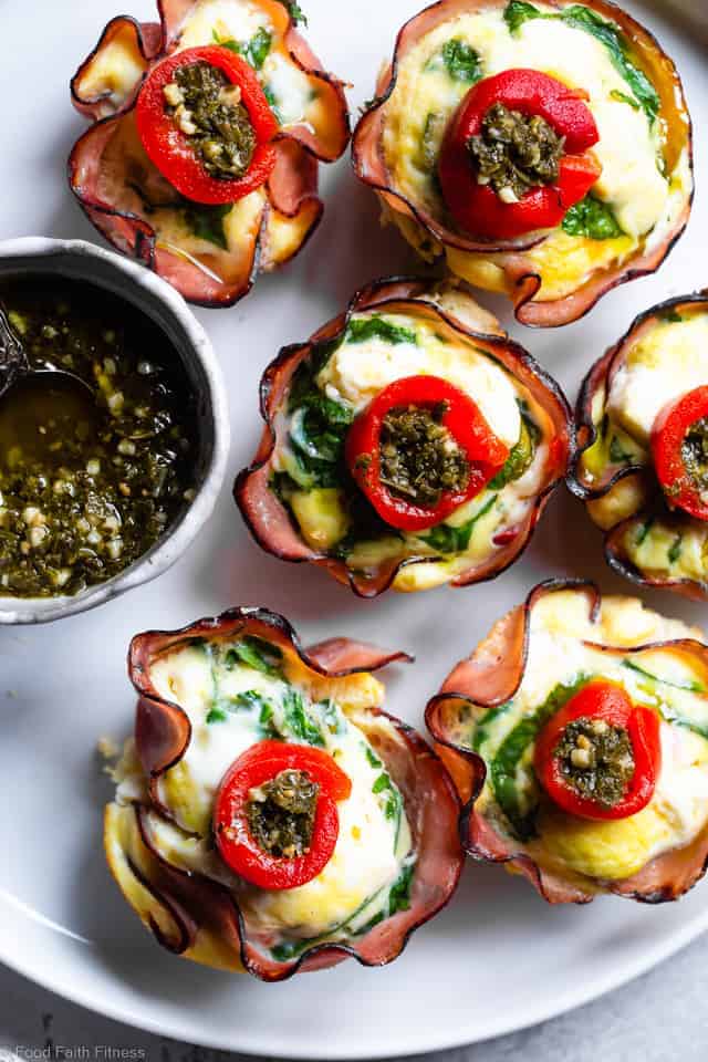 Mediterranean Keto Low Carb Egg Muffins - These easy, healthy egg muffins have a little Mediterranean flair and are packed with protein! A portable, healthy and gluten free breakfast or snack that is keto friendly and low carb! | #Foodfaithfitness | #Glutenfree #Keto #Lowcarb #Breakfast #Healthy