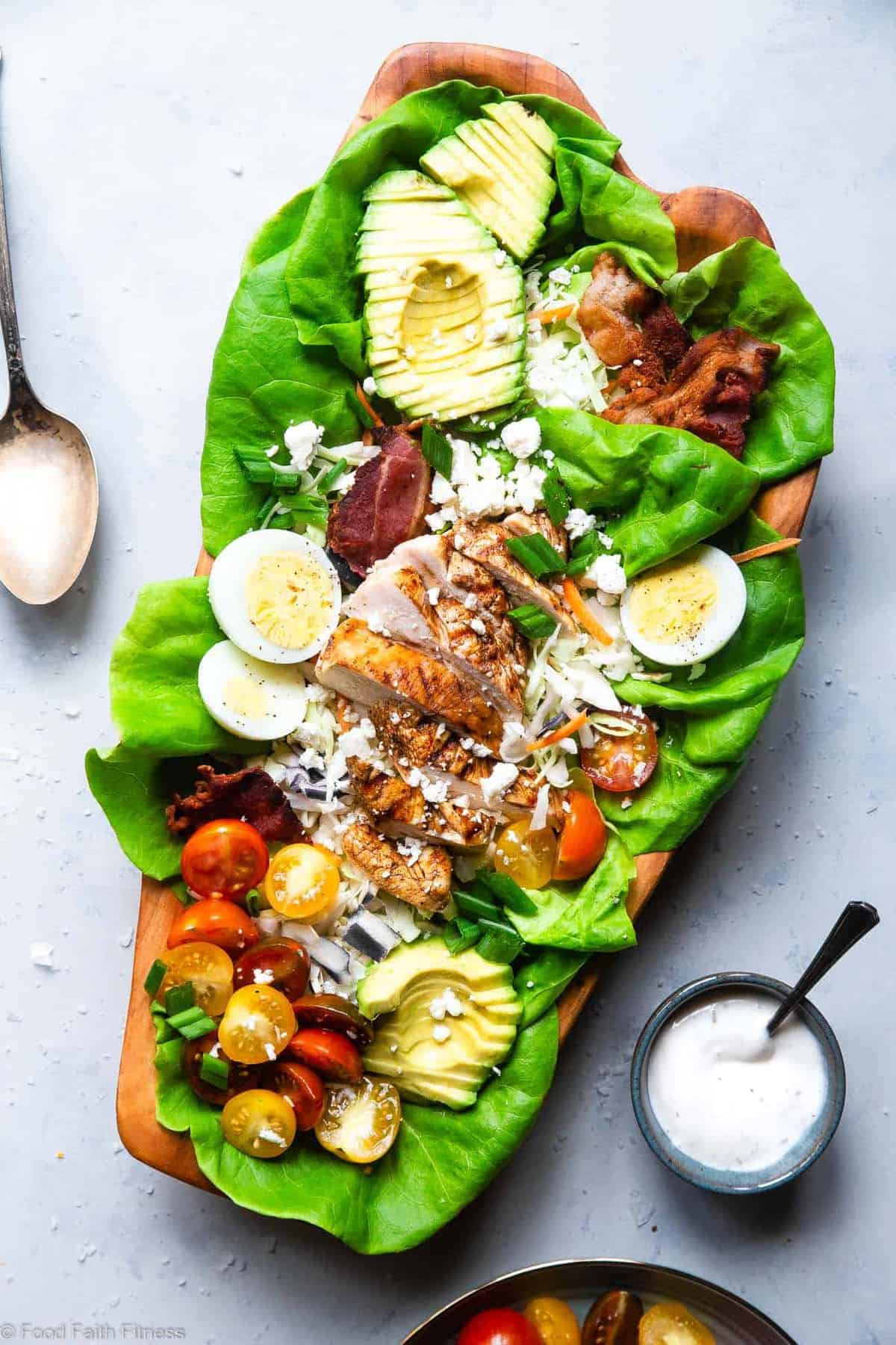 Healthy Chicken Cobb Salad Recipe -Â This quick, easy skinny Chicken Cobb Salad Recipe is a lighter remake that cuts over half the calories of the classic but not the taste! No one will know it's lighter, gluten free and lower carb! | #Foodfaithfitness | #Glutenfree #lowcarb #healthy #salad #grainfree
