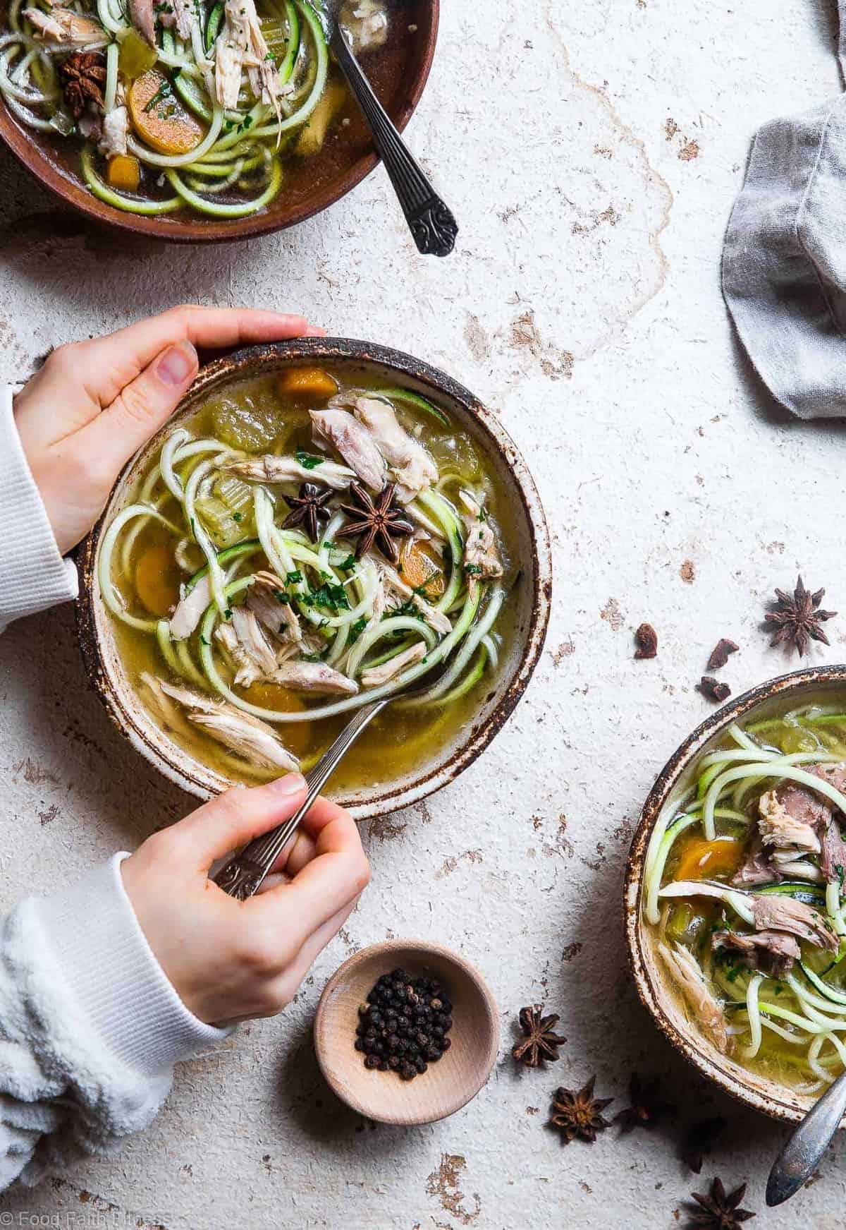 Low carb Chicken Zoodle Soup - This easy homemade healthy keto Chicken Zoodle Soup uses zucchini noodles so it's gluten free, low carb, paleo, whole30 AND packed with protein! You won't miss the noodles! | #Foodfaithfitness | #Glutenfree #Lowcarb #Keto #Whole30 #Paleo