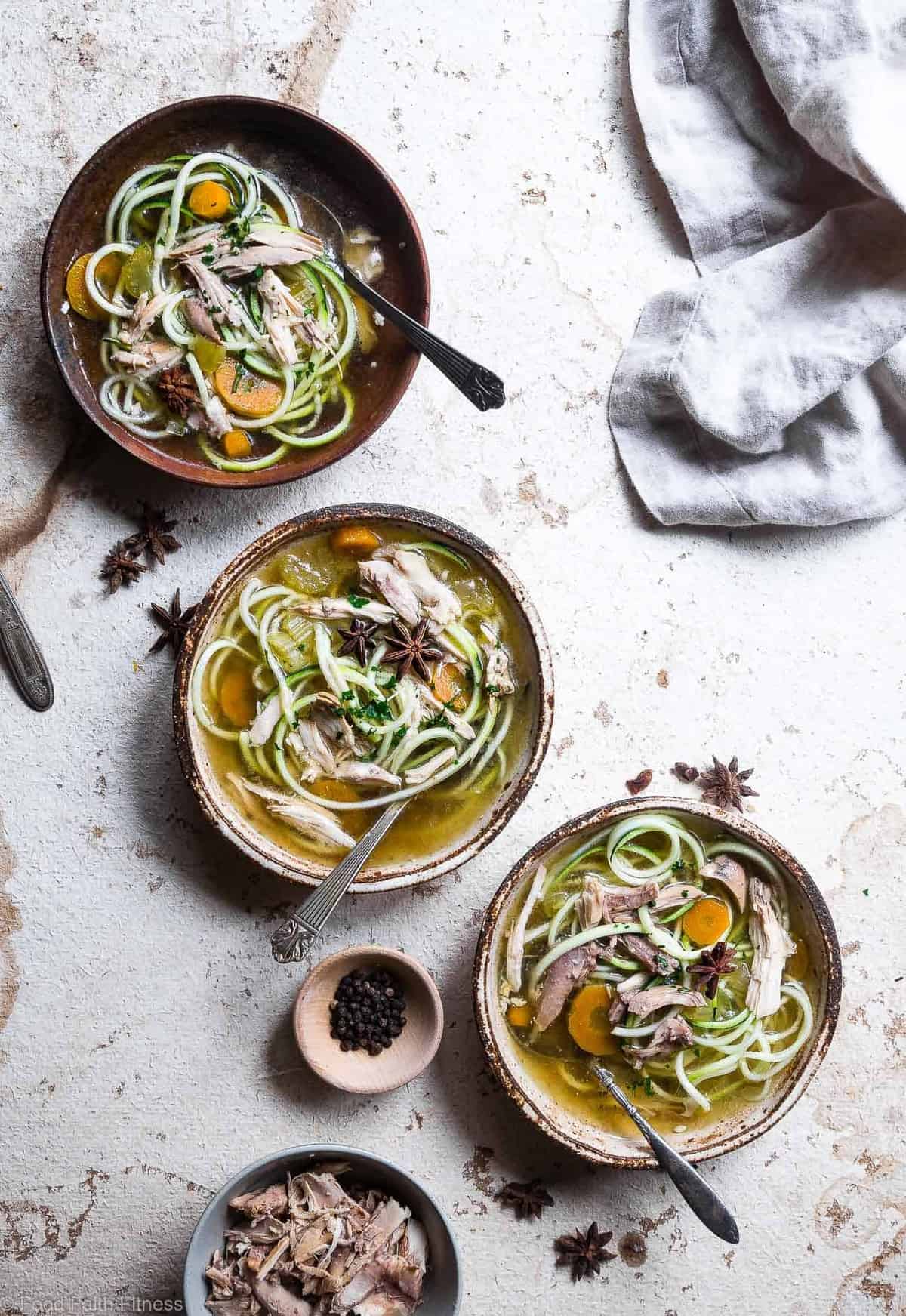 Low carb Chicken Zucchini Noodle Soup - This easy homemade healthy keto Chicken Zoodle Soup uses zucchini noodles so it's gluten free, low carb, paleo, whole30 AND packed with protein! You won't miss the noodles! | #Foodfaithfitness | #Glutenfree #Lowcarb #Keto #Whole30 #Paleo