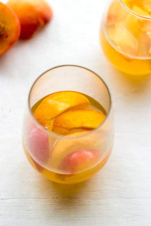White Wine Cocktail with Peaches and Honey Fig Syrup {GF} - Food Faith Fitness