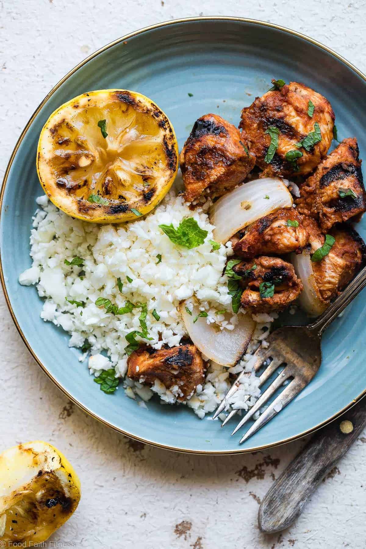 Tomato Grilled Moroccan Chicken Kebabs - These quick and easy, low carb Grilled Moroccan Chicken skewers are complete with a healthy, high protein yogurt mint sauce! Gluten free, only 1 Weight Watchers Freestlye point and SO delicious! | #Foodfaithfitness | #Lowcarb #WeightWatchers #Glutenfree #Healthy #Grilling