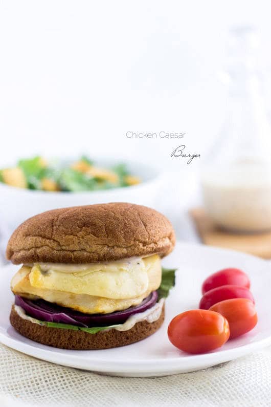 Caesar Grilled Chicken Burger - Like a salad on a bun. Easy, healthy, cheesy and only 350 calories and protein packed! | foodfaithfitness.com | @FoodFaithFit