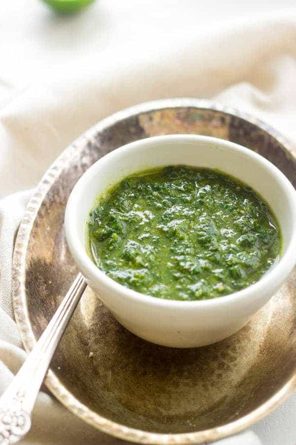 Kale Chimichurri - A quick an easy sauce that is GREAT on meat! |www.foodfaithfitness.com| #glutenfree #recipe #kale