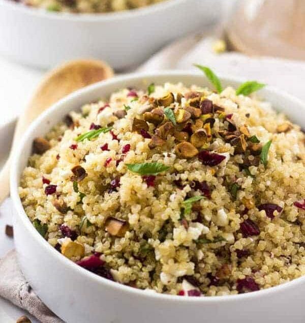 Pistachio Cherry And Feta Quinoa Salad - Crunchy, sweet and tangy this is SO easy and delicious! |www.foodfaithfitness.com| #Recipe #Quinoa #Salad