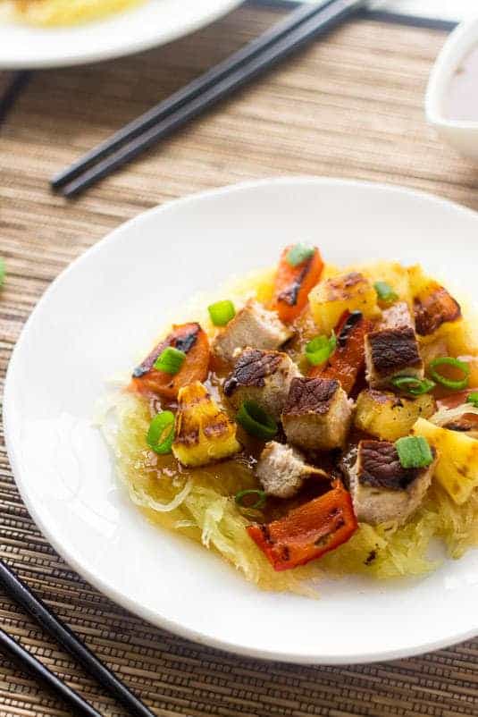 Grilled Sweet and Sour Pork with Spaghetti Squash - A healthy twist on a classic. You won't miss the fried version! | Foodfaithfitness.com | #recipe #spaghettisquash #pork