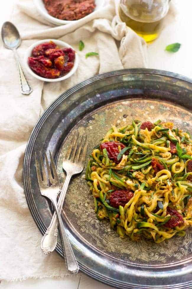 Raw Sundried Tomato Sauce with Zucchini Noodles - An easy meal that is big on flavor, but not on calories! | Foodfaithfitness.com | #raw #vegan #recipe #zucchinoodles