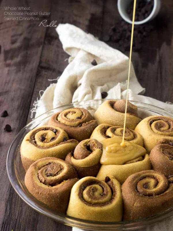 Skinny Chocolate Peanut Butter Swirled Cinnamon Buns - These cinnamon buns are whole wheat and made with Greek yogurt to keep them so light and fluffy! You would never know that they are skinny! You're gonna LOVE them! | Foodfaithfitness.com | #Recipe