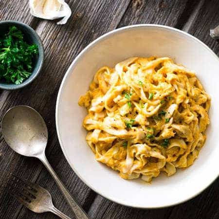 Creamy Pumpkin Pasta - A secret, 10 calorie noodle keeps this pasta healthy! It's quick, easy and perfect for a comforting, weeknight meal! | Foodfaithfitness.com | #recipe