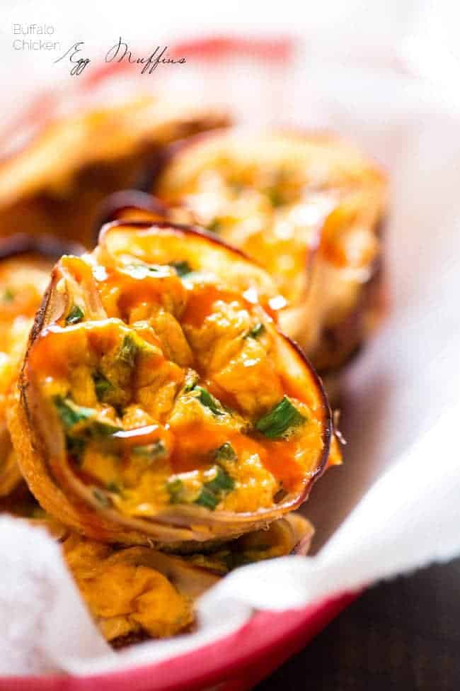 Buffalo Chicken Egg Muffin Recipe - Protein Packed and ready in 20 minutes, these are perfect for a healthy on the go breakfast or game day bite! | Foodfaithfitness.com | #recipe