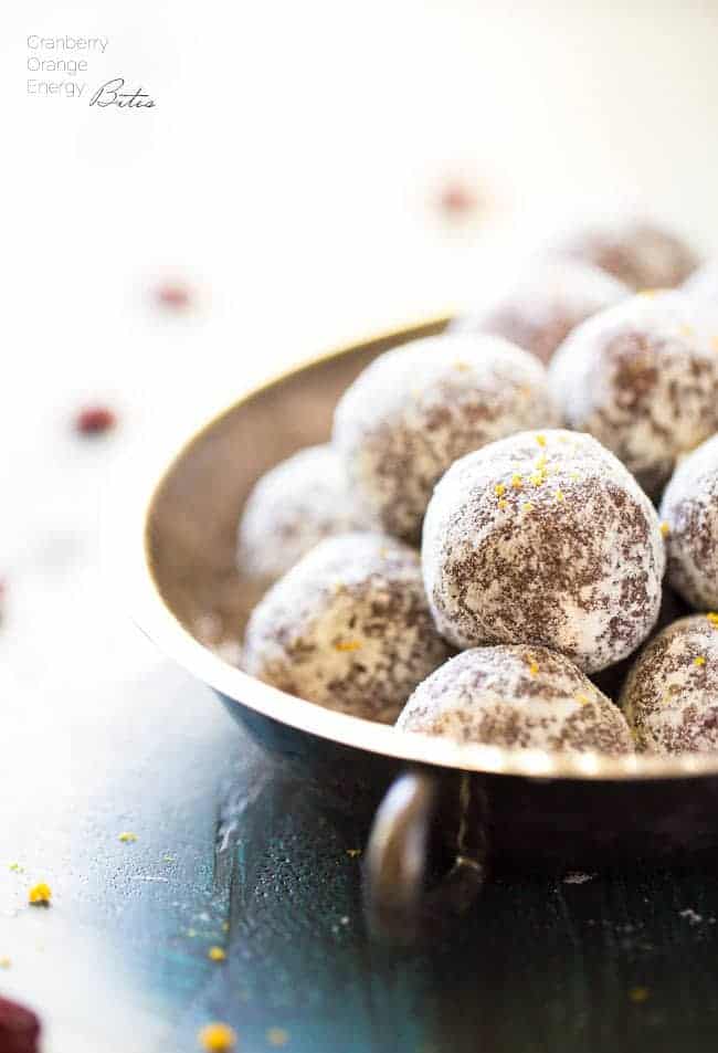 Cranberry Orange Energy Bites - Ready in 5 minutes, only 6 ingredients and gluten fee and paleo friendly! You NEED these! | Foodfaithfitness.com | #recipe