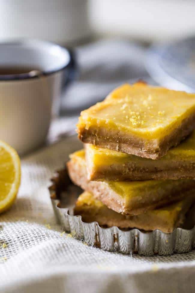 Paleo Lemon Bars - A healthy, grain/refined sugar free remake of the classic! SO easy and only 5 ingredients! | Foodfaithfitness.com | @FoodFaithFit