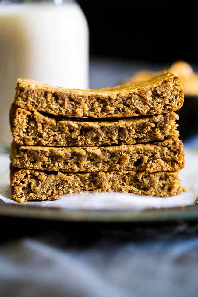 Paleo Almond Butter Homemade Protein Bars - 5 ingredients, one bowl and 20 minutes is all you need to make these soft and chewy bars! The a healthy, portable snack! | Foodfaithfitness.com | @FoodFaithFit