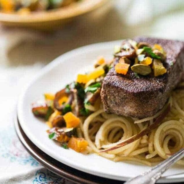 Morrocan Style Paleo Pork Chops with Spiralized Apples Noodles - So JAM packed with flavor, this meal is ready in under 30 minutes and is healthy, grain, dairy and gluten free! | Foodfaithfitness.com | @FoodFaithFit