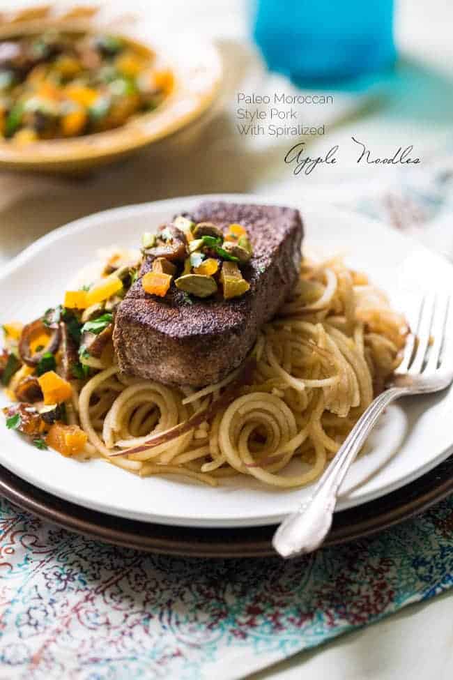 Morrocan Style Paleo Pork Chops with Spiralized Apples Noodles - So JAM packed with flavor, this meal is ready in under 30 minutes and is healthy, grain, dairy and gluten free! | Foodfaithfitness.com | @FoodFaithFit
