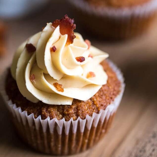 Paleo Maple Bacon Gluten Free Cupcakes - Naturally sweetened with maple syrup, swirled with bacon and topped with Bacon Buttercream! You NEED to try these! | Foodfaithfitness.com | @FoodFaithFit