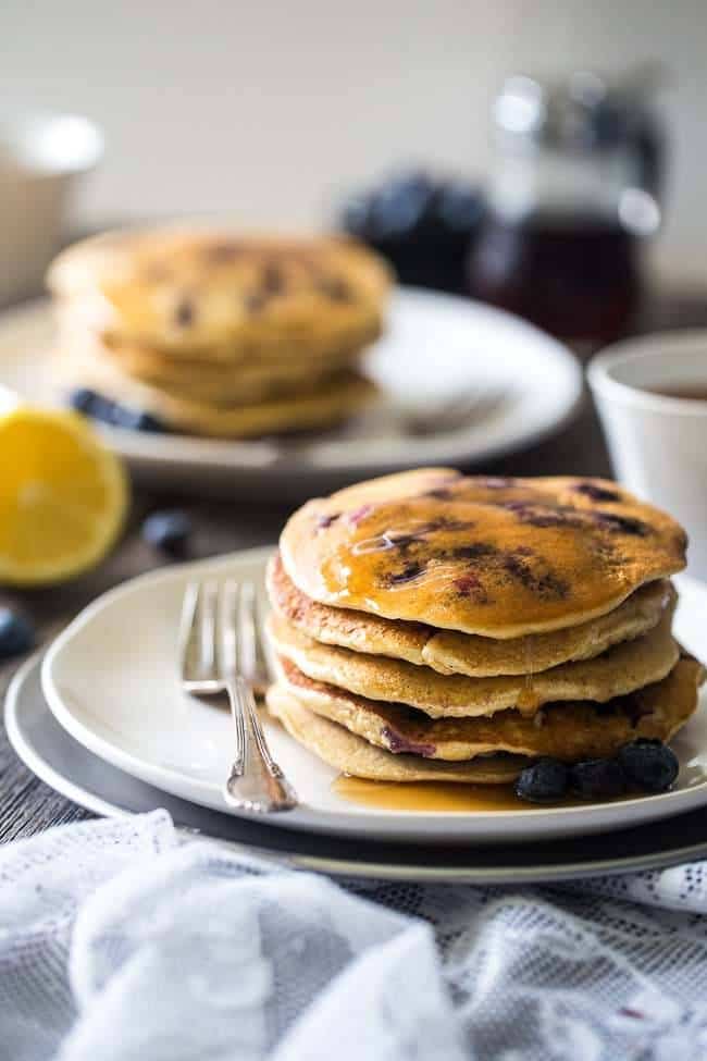 Quinoa Blueberry Lemon Gluten Free Pancakes - Made with Greek yogurt for a healthy breakfast that is packed with protein and perfect for Spring! | Foodfaithfitness.com | @FoodFaithFit