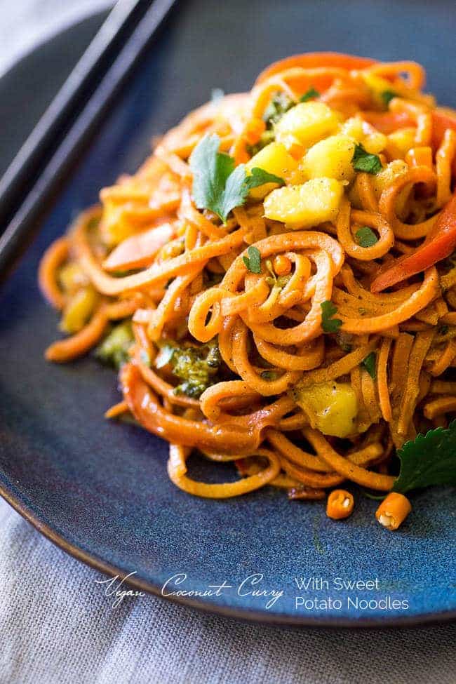 Vegan Coconut Curry with Sweet Potato Noodles – This curry is ULTRA creamy and loaded with veggies, for a quick and SO easy, healthy dinner that is gluten free, vegan and paleo friendly! This has RAVE reader reviews! | #FoodFaithFitness | #Glutenfree #Vegan #Paleo #Dairyfree #Healthy