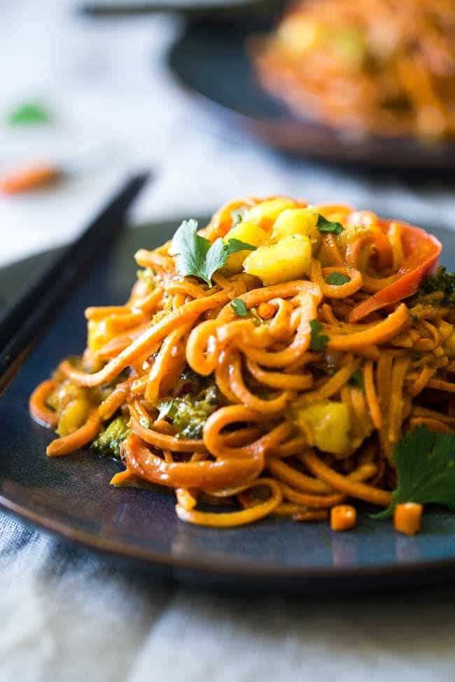 Vegan Coconut Sweet Potato Curry with Sweet Potato Noodles – This curry is ULTRA creamy and loaded with veggies, for a quick and SO easy, healthy dinner that is gluten free, vegan and paleo friendly! This has RAVE reader reviews! | #FoodFaithFitness | #Glutenfree #Vegan #Paleo #Dairyfree #Healthy