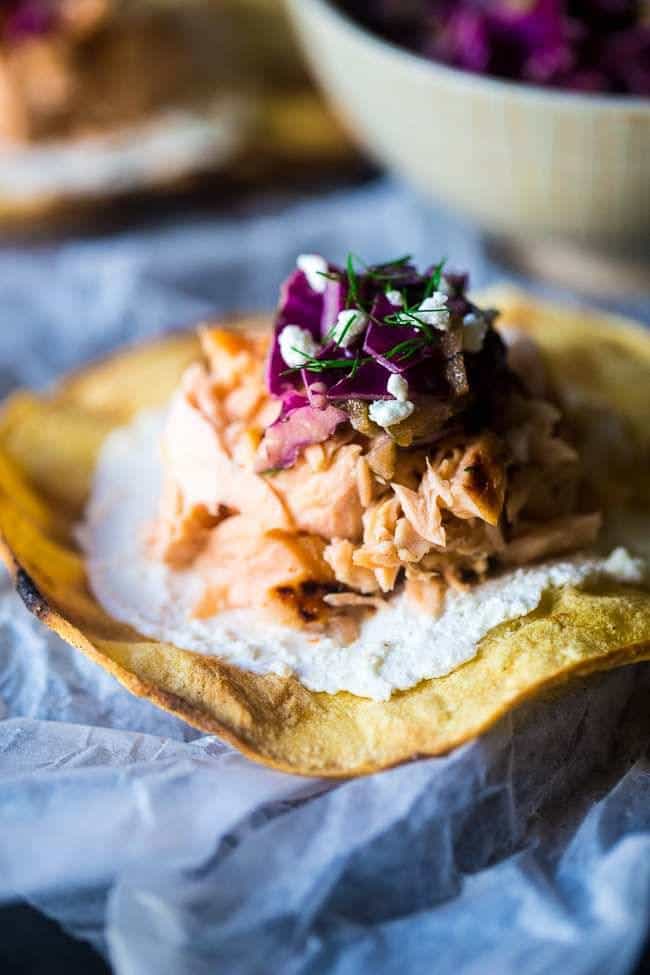 Grilled Maple Salmon Tostadas – Crunchy grilled tortillas are topped with Dijon mustard slaw and creamy goat cheese for a gluten free, healthy meal or appetizer, that's so easy to make! | Foodfaithfitness.com | @FoodFaithFit