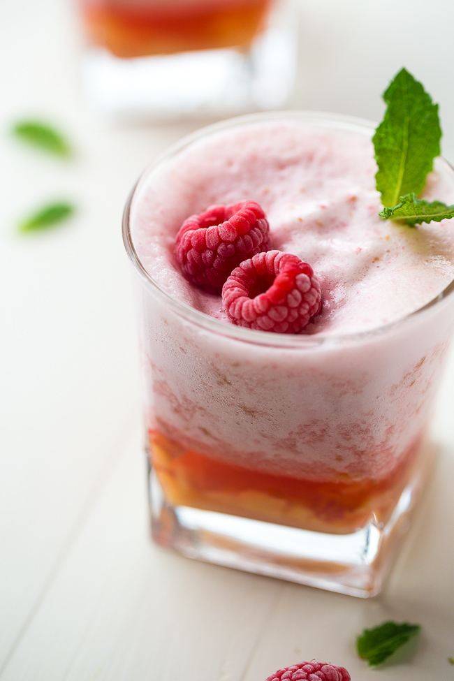Frosted Peach Raspberry Lemonade - This frosted raspberry lemonade uses a secret ingredient to keep to high protein, sugar free and low calorie! A refreshing, healthy, drink for Summer! | Foodfaithfitness.com | @FoodFaithFit