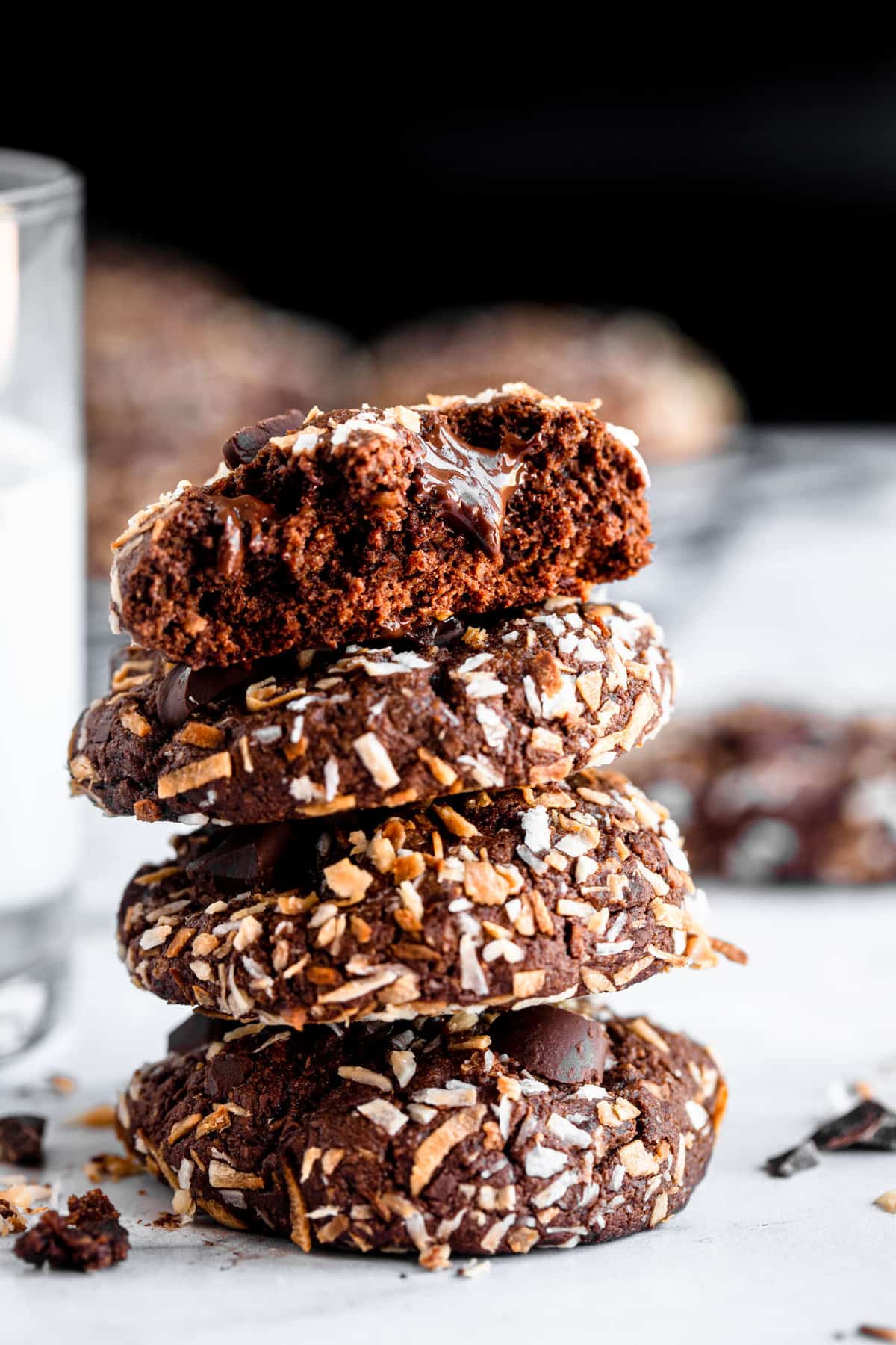 stack of quinoa cookies with milk on the side