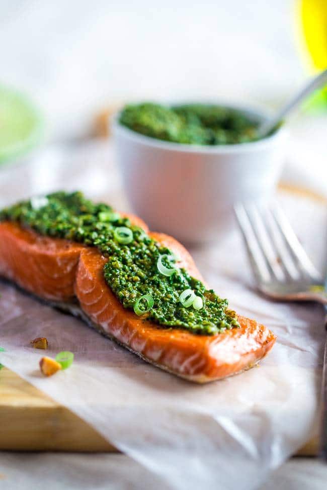 Baked Salmon with Asian Cilantro Pesto - A simple, healthy and easy dinner that feels SO fancy, but is ready in under 30 minutes! It's gluten free, low carb and only 300 calories! | Foodfaithfitness.com | @FoodFaithFit