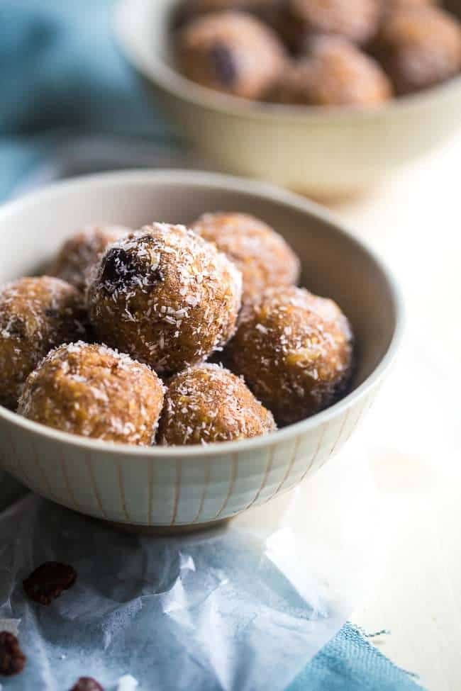 Paleo Coconut Rum Raisin Energy Balls - A quick and easy snack that are ready in only 10 minutes! A healthy, high protein and gluten free taste of the tropics to give you an energy boost! | Foodfaithfitness.com | @FoodFaithFit