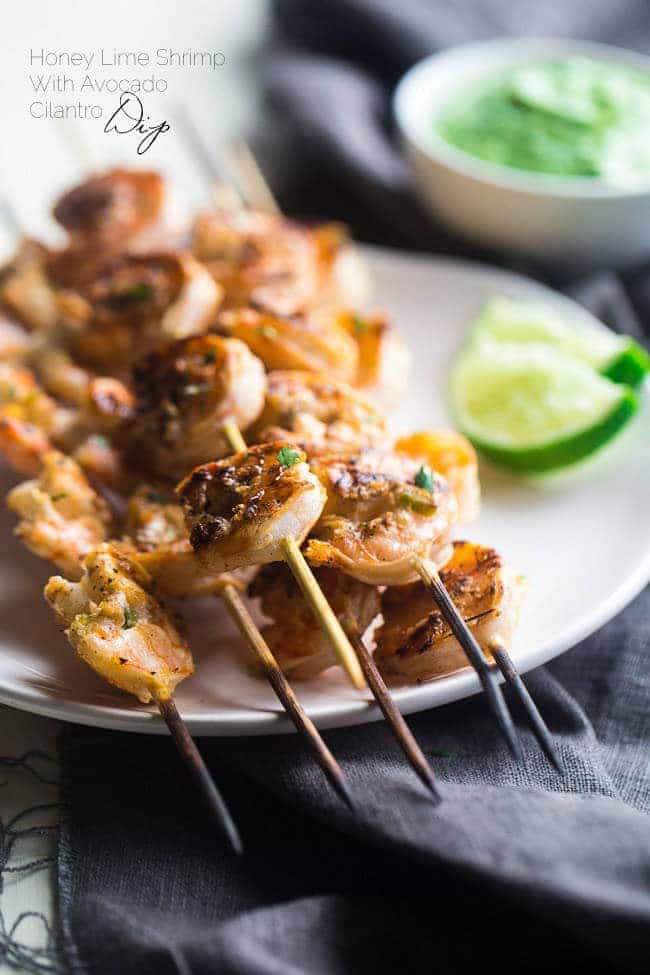 Cilantro Lime Grilled Shrimp with Avocado Cilantro Dip - Marinated in lime juice, honey and jalapeno pepper, then grilled for a quick and easy, healthy meal that's gluten free, low carb and low fat! | Foodfaithfitness.com | @FoodFaithFit