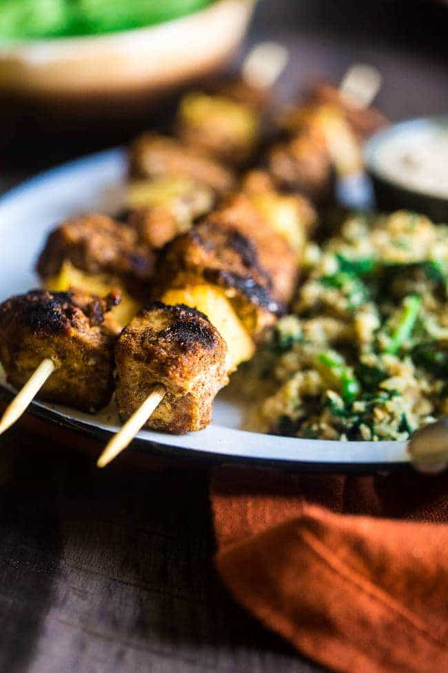 Indian Paleo Chicken Kebabs with Cashew Cream Dip - This chicken kebab recipe is served with coconut cashew cream for an easy, healthy, Summer meal that will take you to the Middle East! | Foodfaithfitness.com | @FoodFaithFit