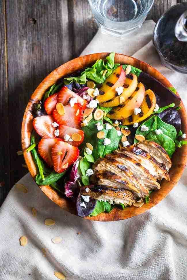 Strawberry Salad with Grilled Nectarines and Balsamic Vinaigrette - A healthy, summer salad that is loaded with sweet strawberries, grilled chicken and nectarines and topped with tangy balsamic vinaigrette. Easy and gluten free! | Foodfaithfitness.com | @FoodFaithFit