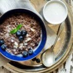 Vegan Coconut Blueberry Slow Cooker Oatmeal - Let the slow cooker do the work for you with this easy, healthy and sugar/gluten/dairy free oatmeal that is creamy and sweet! Perfect to make ahead for busy mornings! | Foodfaithfitness.com | @FoodFaithFit