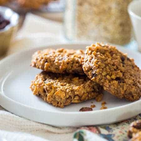 Apple Raisin Breakfast Cookie s - These easy, one-bowl breakfast cookies are made with oatmeal, apples, raisins and almond butter for a healthy, vegan & gluten free breakfast. They're perfect for busy mornings! | Foodfaithfitness.com | @FoodFaithFit