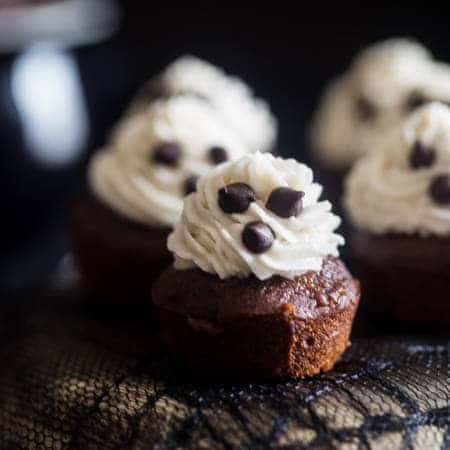 Paleo + Vegan Spooky Mini Chocolate Banana Cupcakes with Coconut Cream - These mini cupcakes are naturally sweetened, paleo and vegan friendly and are only 100 calories! They're always a hit at Halloween parties! | Foodfaithfitness.com | @FoodFaithFit