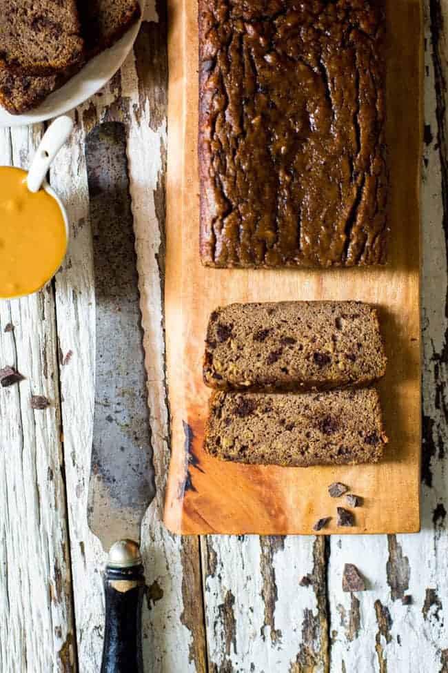 Paleo Chocolate Almond Butter Banana Bread - This easy, healthy Paleo banana bread is made extra delicious with almond butter and chocolate! It's a gluten free, portable breakfast or snack! | Foodfaithfitness.com | @FoodFaithFit