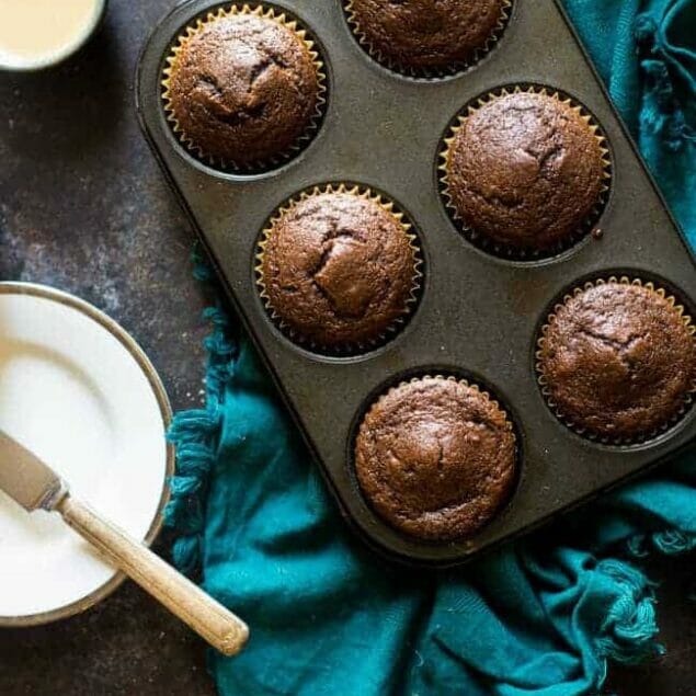 Maple Tahini Chocolate Paleo Muffins - These gluten free chocolate muffins are sweetened with maple syrup and have a hint of tahini. They're a healthy, easy breakfast for busy mornings that are only 170 calories! | Foodfaithfitness.com | @FoodFaithFit