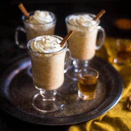 Maple Pumpkin Steamed Almond Milk with Bourbon - Mixed with pumpkin puree, naturally sweetened with maple syrup and finished with bourbon. It's an easy, cozy drink for the fall! | Foodfaithfitness.com | @FoodFaithFit