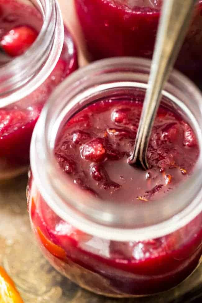 Paleo Maple Orange Cranberry Sauce - This healthy, homemade cranberry sauce uses only 3 ingredients and is Paleo friendly and refined- sugar free! It's ready in 30 minutes and is perfect for Thanksgiving! | Foodfaithfitness.com| @FoodFaithFit