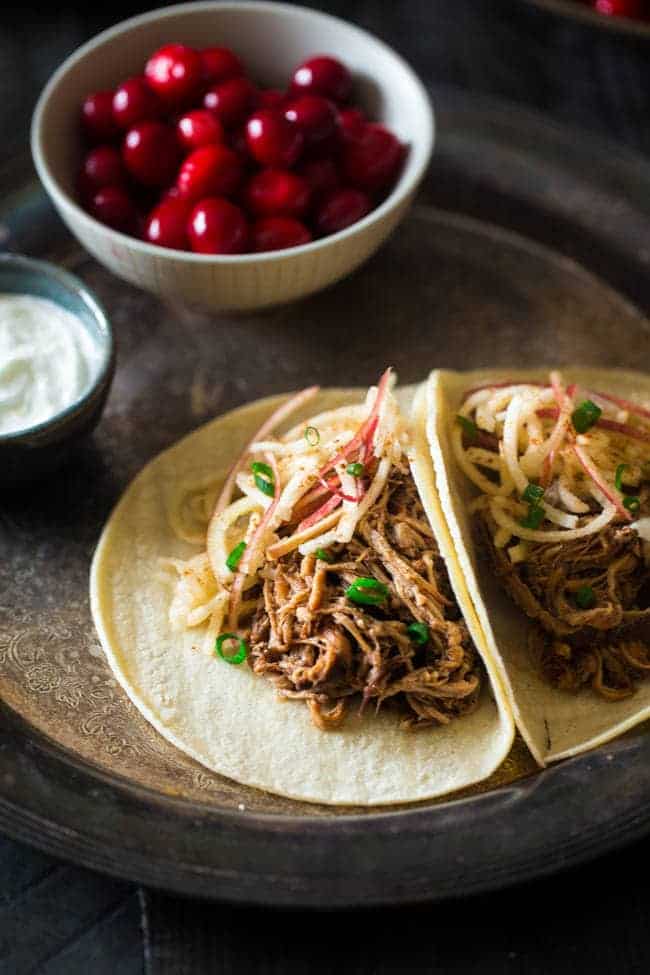 Gluten Free Cranberry, Apple Chipotle Slow Cooker Pork Tenderloin Tacos - These healthy tacos are packed with spicy-sweet, fall flavor and are an easy, weeknight meal that the whole family will love! | Foodfaithfitness.com | @FoodFaithFit