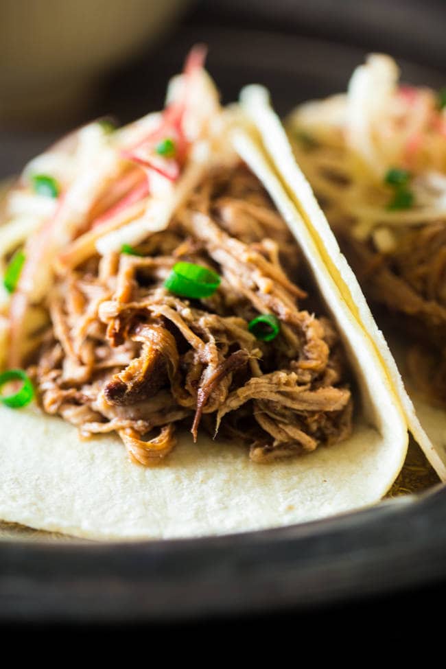 Gluten Free Cranberry, Apple Chipotle Slow Cooker Pork Tenderloin Tacos - These healthy tacos are packed with spicy-sweet, fall flavor and are an easy, weeknight meal that the whole family will love! | Foodfaithfitness.com | @FoodFaithFit