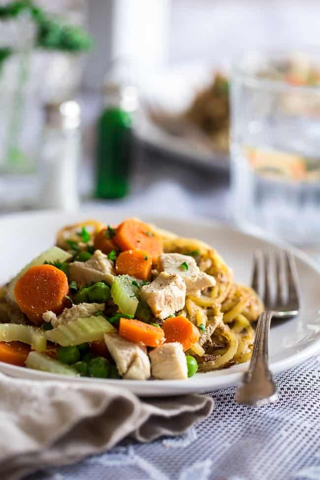 Healthy Spiralized Chicken Pot Pie with Potato Noodles - Spiralized potato noodles, creamy Greek yogurt sauce, chicken, carrots and peas make up this gluten free, chicken pot pie, that is sure to please the pickiest of eaters! Ready in 30 minutes too! | Foodfaithfitness.com | @FoodFaithFit