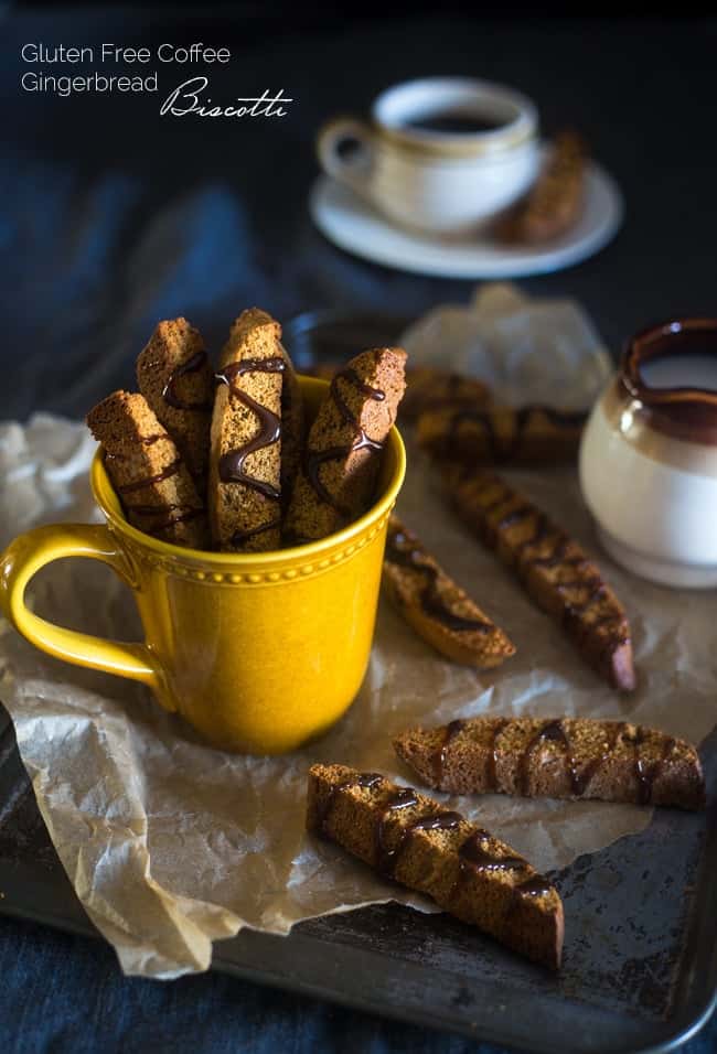 Gluten Free Gingerbread Biscotti with Coffee Glaze - These Gingerbread gluten free biscotti are made with oat flour and have a sweet coffee glaze! They're a healthy Christmas cookie that are only 106 calories! | Foodfaithfitness.com | @FoodFaithFit
