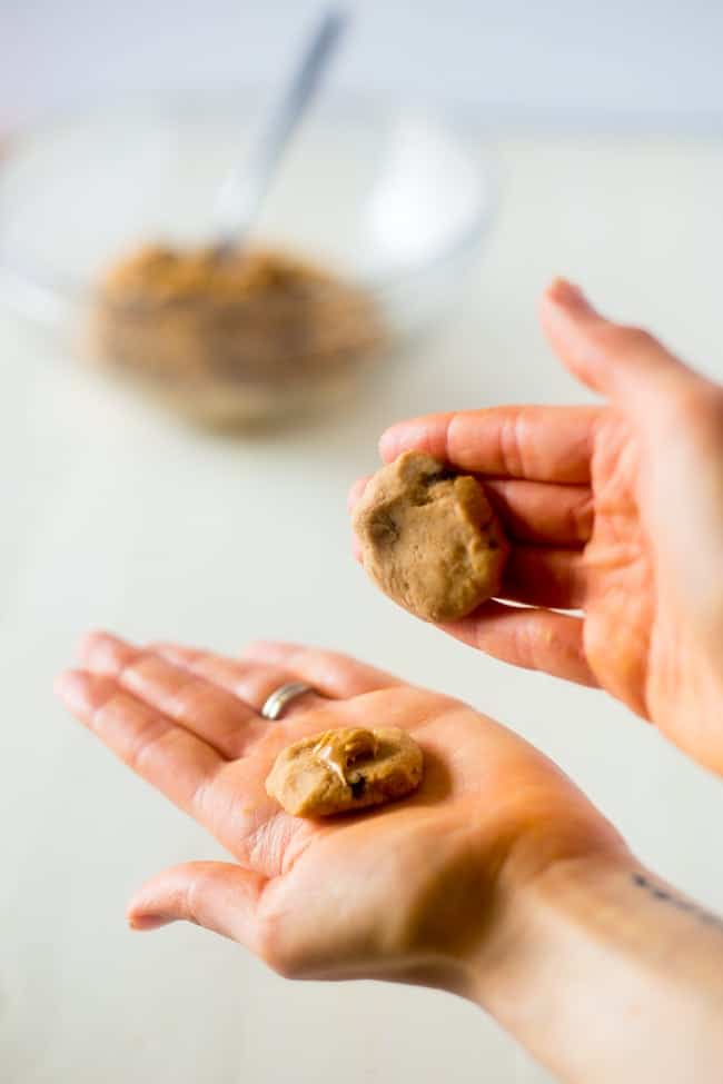 Peanut Butter Stuffed Vegan Cookie Dough Bites - SO easy to make and loaded with peanut butter and chocolate chips! You would never know they're secretly healthy, gluten free and only 65 calories! | Foodfaithfitness.com | @FoodFaithFit